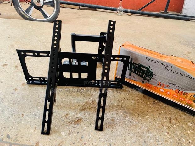 Affordable Adjustable Corner Wall Mount for 32-55” Tv · Photo 1
