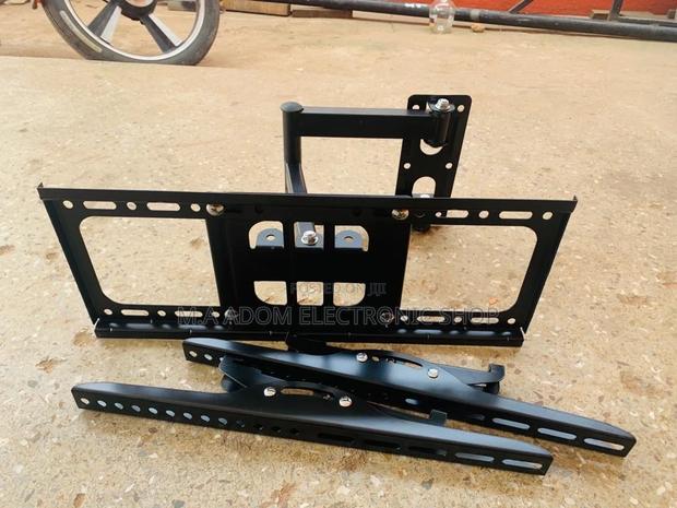 (32”-55”)Authentic Adjustable Corner Wall Mount for Tv · Photo 1