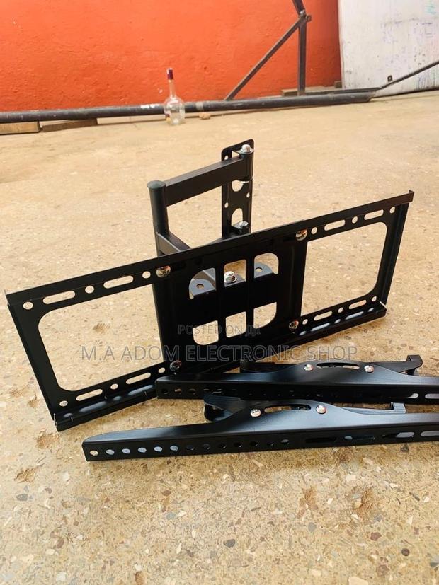 Quality Adjustable Corner Wall Mount for 32-55” Tv · Photo 1