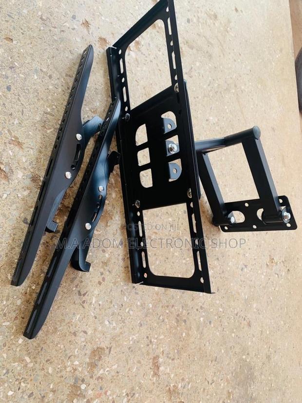 (32”-55”)Affordable Adjustable Corner Wall Mount · Photo 1