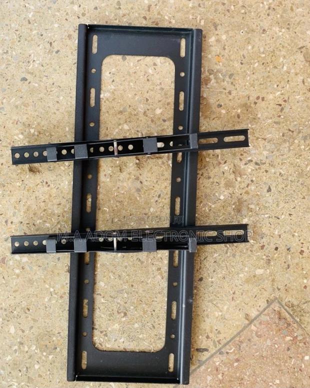 (32”-70”)Fresh in Box Full Motion Adjustable Wall Mount · Photo 1