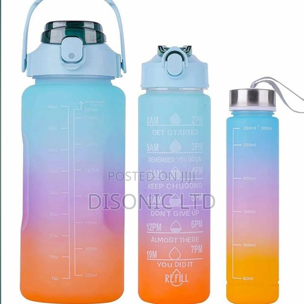 A Set of 3 School Children Drinking Water Bottles · Photo 3