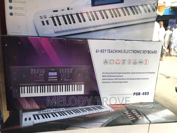 PSR-493 61-Key Teaching Electronic Keyboard · Photo 1