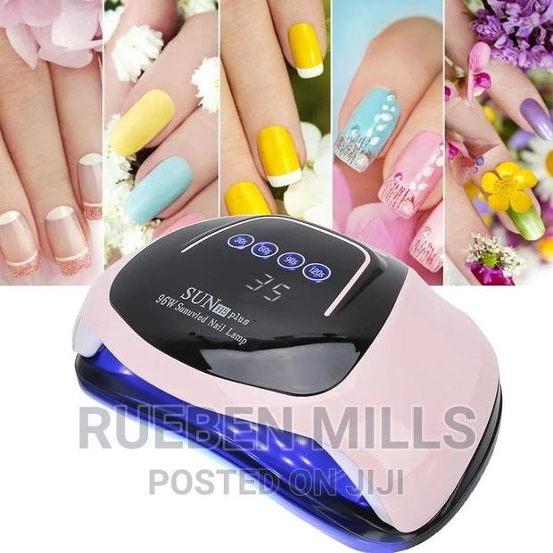 Two Hands Pink Nail Dryer · Photo 1