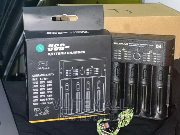 4slot USB Battery Charger - PUJIMAX · Photo 1