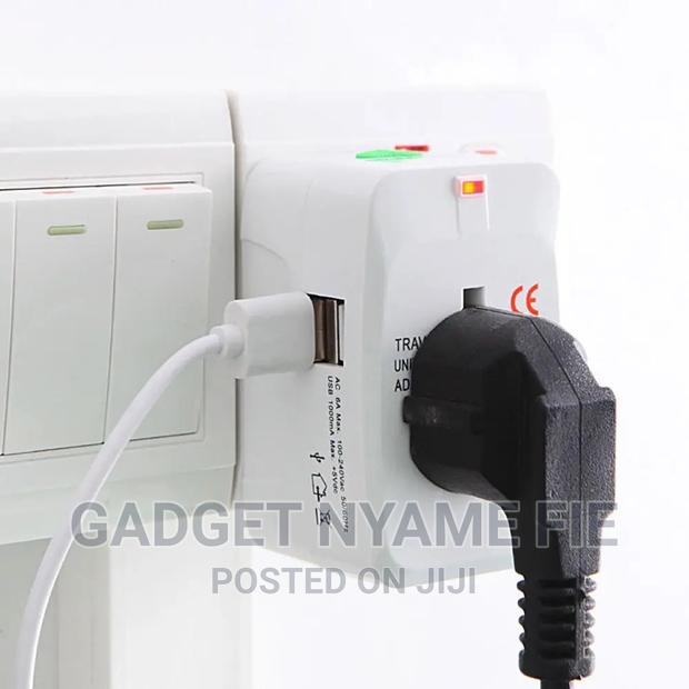 Universal (Eu/ Us/ Uk/ Au )Travel Ac Power Adaptor (100-250 Volts) · Photo 1
