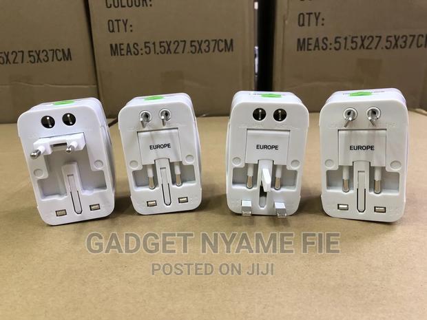 Universal (Eu/ Us/ Uk/ Au )Travel Ac Power Adaptor (100-250 Volts) · Photo 2