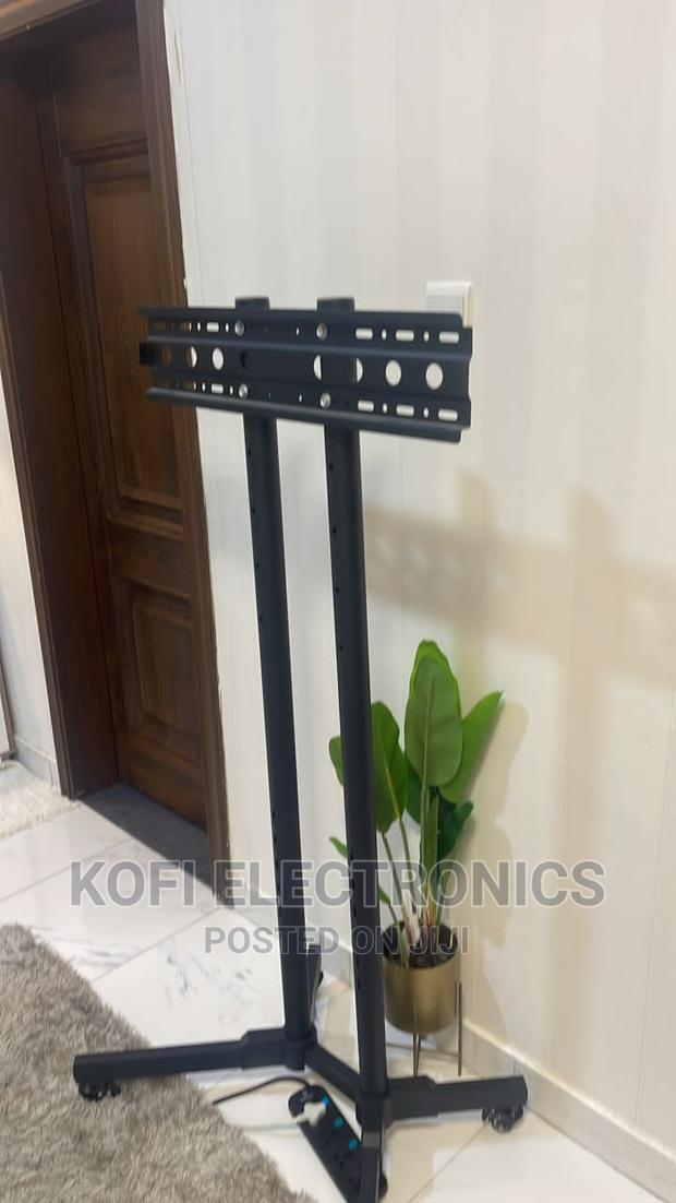 32-70inch Tv Mobile Stand Durable, and Versatile Solution · Photo 1