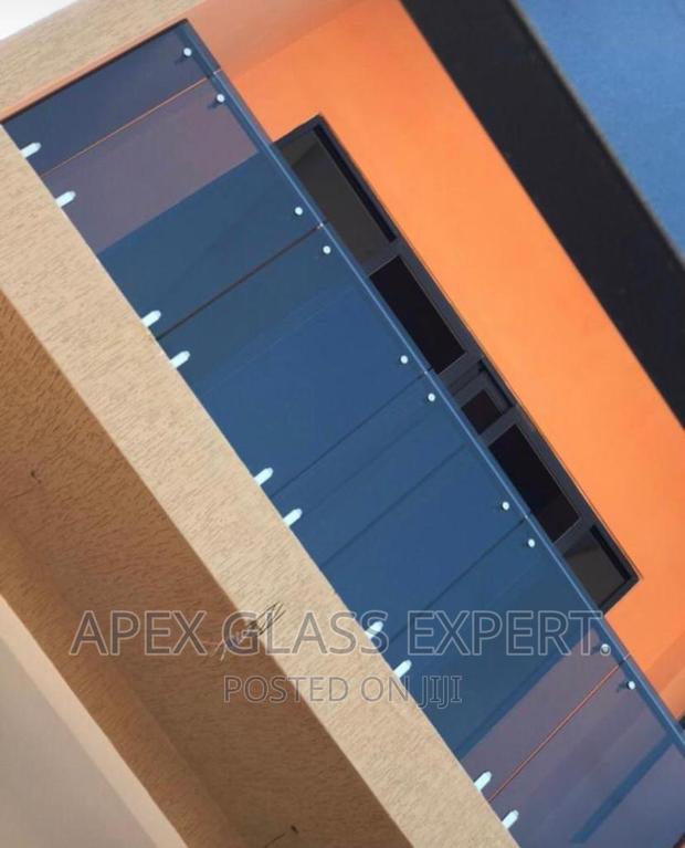 6+6mm Dark Glass Balcony Balustrade by Apex Glass Expert. · Photo 1