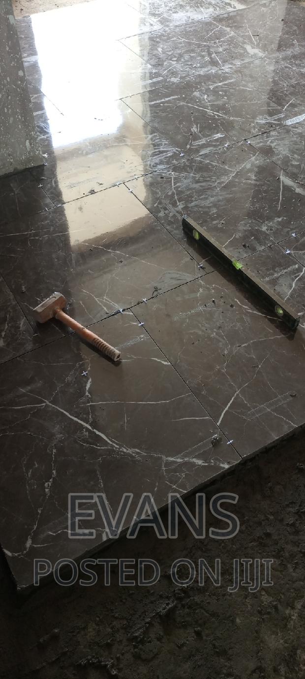 Quality and Affordable Team of Tiles Layer Ready to Work . · Photo 7