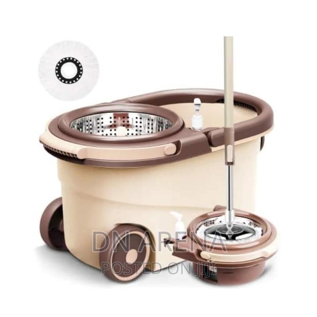 Quality Wheel Spin Mop Bucket With Two Mop Head · Photo 1