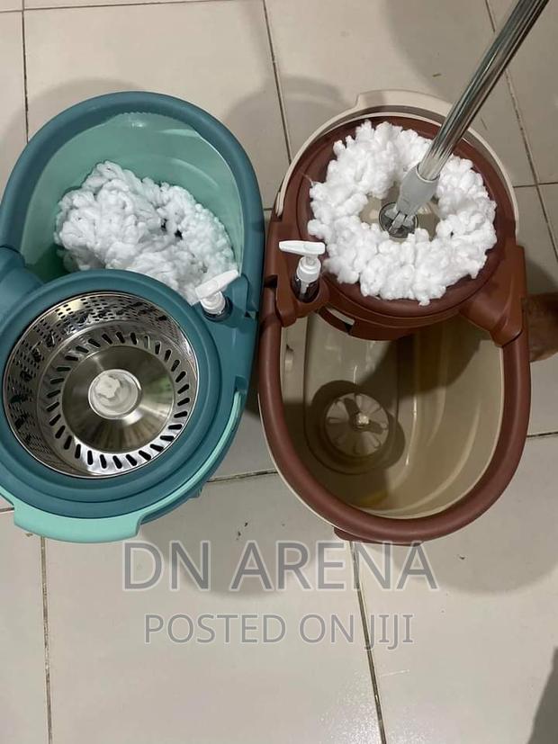Quality Wheel Spin Mop Bucket With Two Mop Head · Photo 4