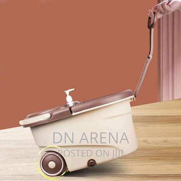 Quality Wheel Spin Mop Bucket With Two Mop Head · Photo 3