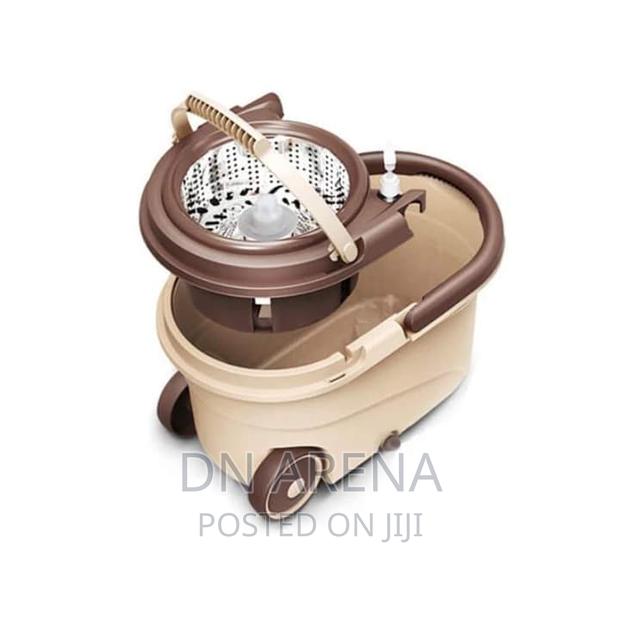 Quality Wheel Spin Mop Bucket With Two Mop Head · Photo 5