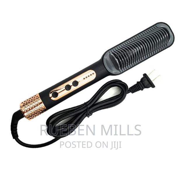 950 Degrees Max Heating Ring Hot Comb Hair Straightener · Photo 1