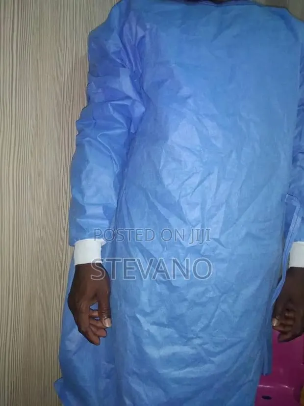 Disposable Lab Coat · Photo 1