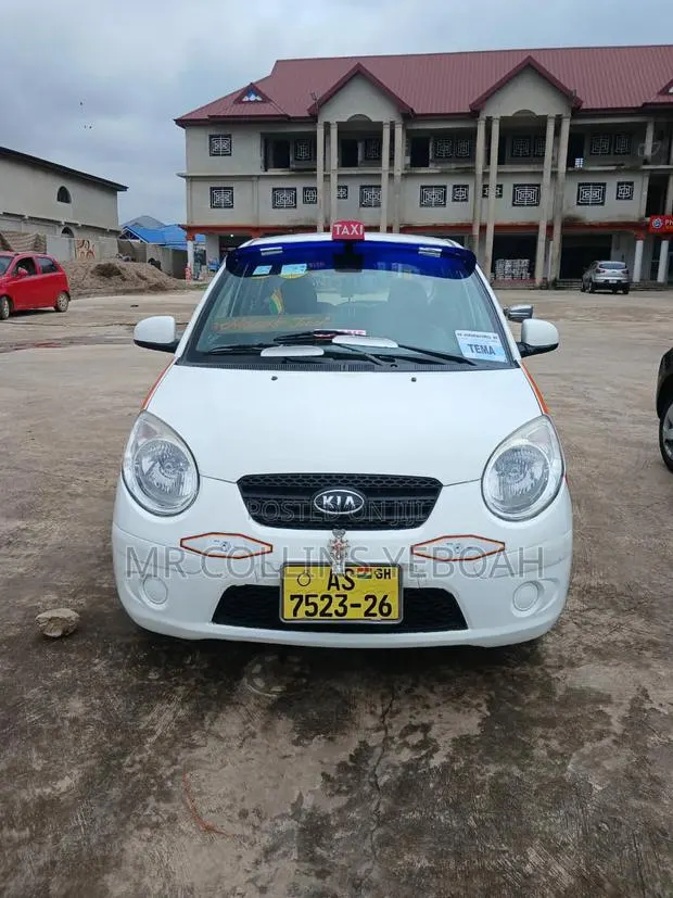 Kia Picanto 1.1 2010 White · Photo 1
