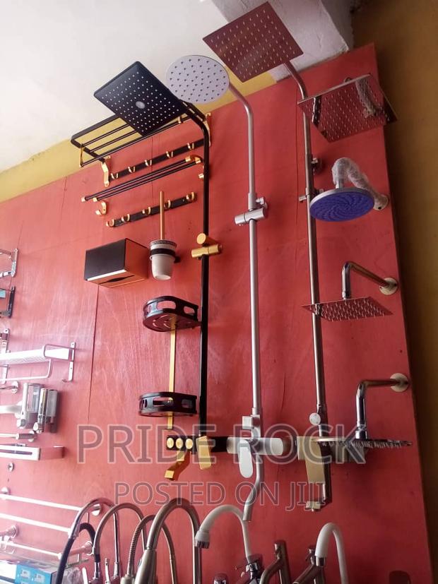 Black and Gold Rain Shower,Shower Pole, Telephone · Photo 1