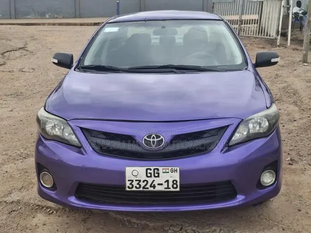 Toyota Corolla Base 4dr Sedan (1.8L 4cyl 5M) 2009 Purple · Photo 1