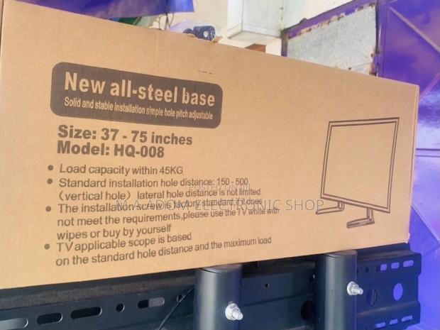 Original Tv Led Stand for TVS Between 32”-75”(Black) · Photo 1