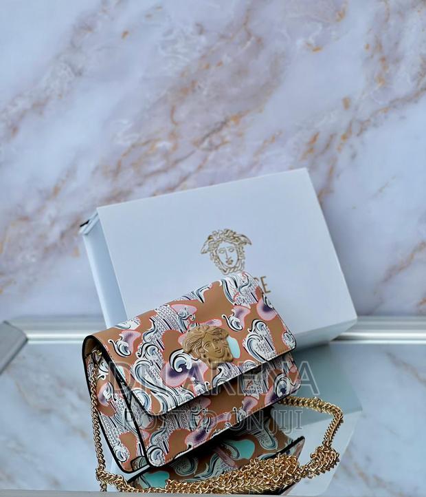 *New Versace in a · Photo 2