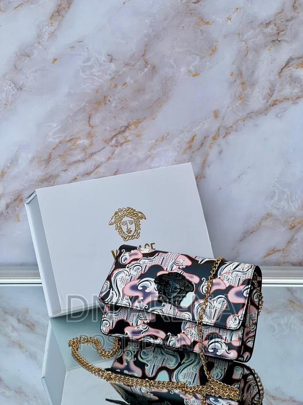 *New Versace in a · Photo 3