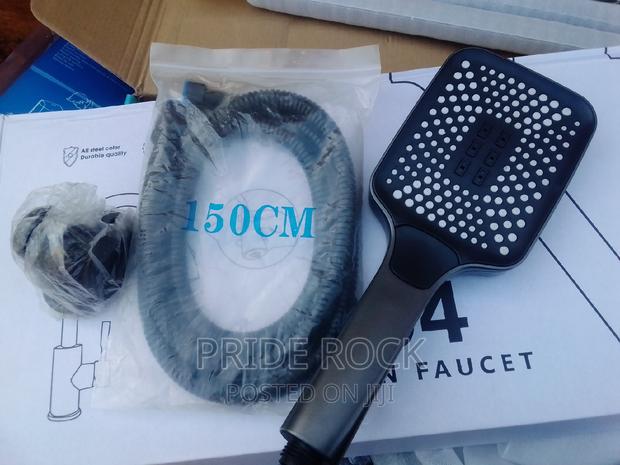 Hand Held Shower, Telephone Shower and Chain · Photo 1