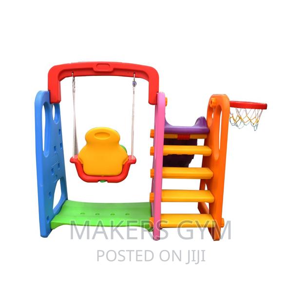 Playground Slide With Seasaw and Basketball Hoop · Photo 1