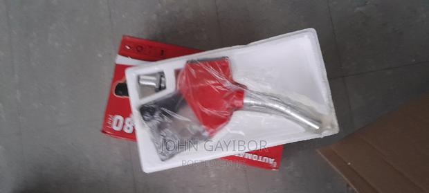 Electronic Fuel Nozzle With Metered Flow Meter · Photo 1