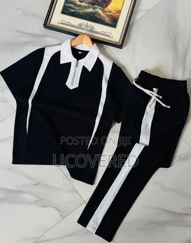 Textured Set Includes a Zip-Up Polo Shirt and Matching Trousers · Photo 1
