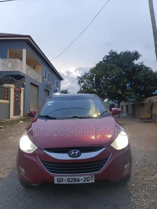 Hyundai Tucson 2013 Red · Photo 1