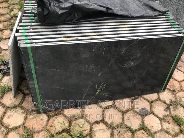 Granite and Marble Tiles · Photo 1