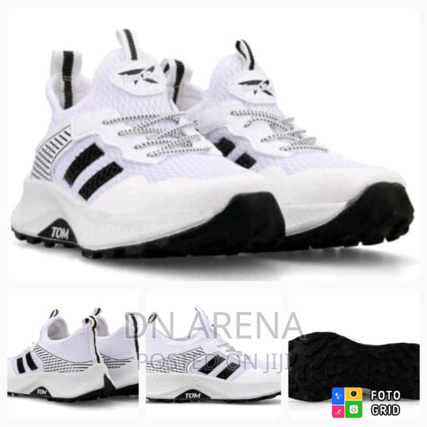 Tomkid Sneakers Size 31 to 35 Only · Photo 3
