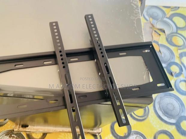 Quality Tilting Wall Mount for 32” to 80” Tv(Black) · Photo 1
