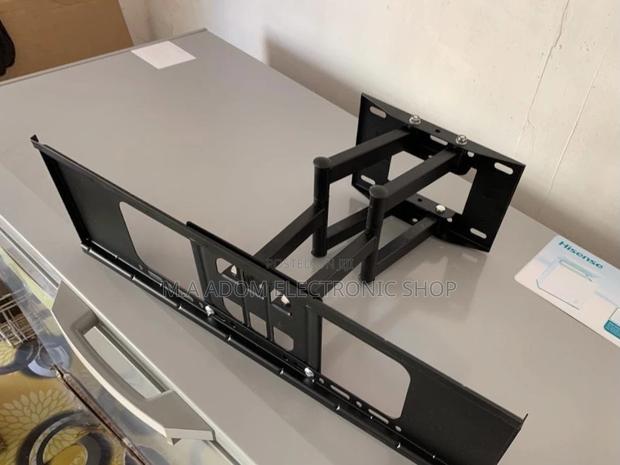 Durable and Affordable Adjustable Double Arm Tv Mount · Photo 1