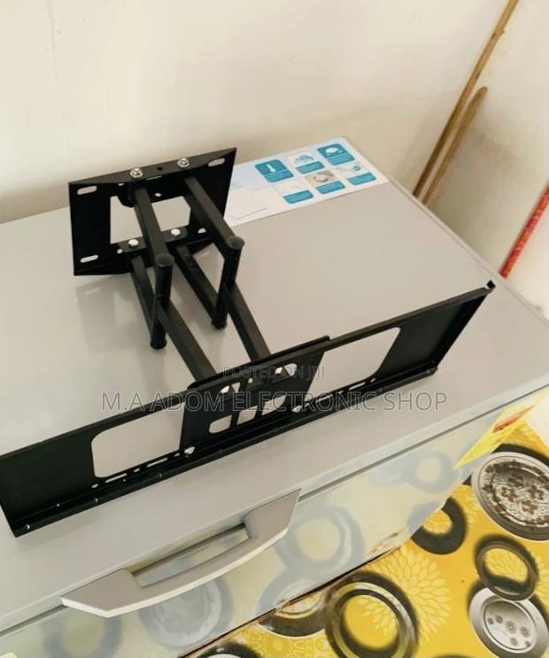 Authentic Adjustable Double Arm Tv Mount · Photo 1