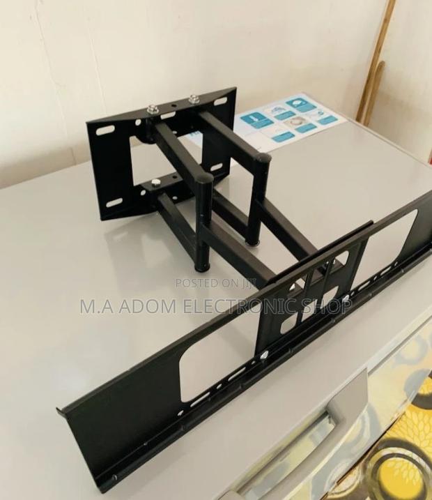 Fresh in Box Adjustable Double Arm Tv Mount(Black). · Photo 1