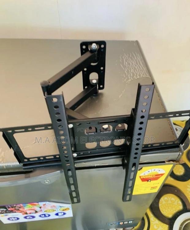 Shop Classic Adjustable Corner Tv Mount for 32”-55” · Photo 1