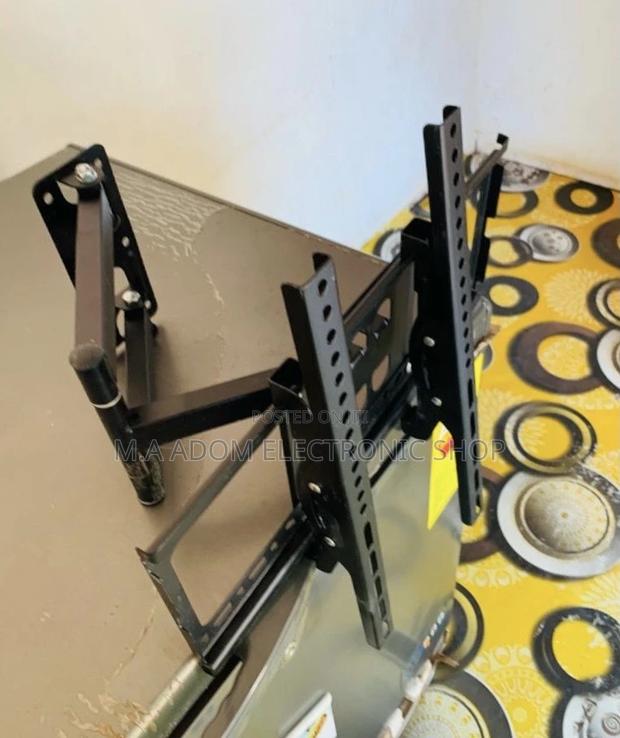 Shop Quality Adjustable Corner Tv Mount for 32”—55” · Photo 1