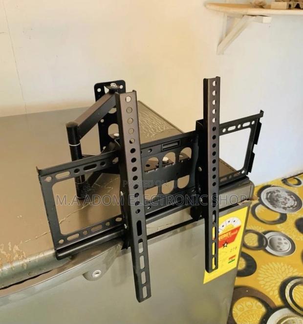 Fabulous Adjustable Corner Tv Mount for 32” to 55” · Photo 1