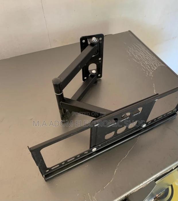 Buy Authentic Adjustable Corner Tv Mount for 32”-55” · Photo 1