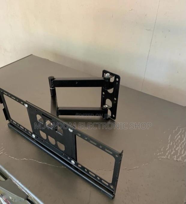 Buy Affordable Adjustable Corner Tv Mount 32-55” · Photo 1