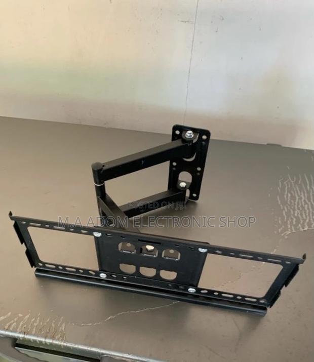 Buy Reliable Adjustable Corner Tv Mount for 32” to 55” · Photo 1