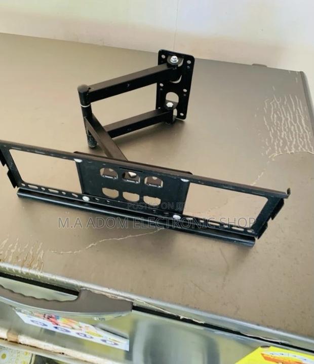 Basic Black Adjustable Corner Tv Mount for 32” to 55” · Photo 1