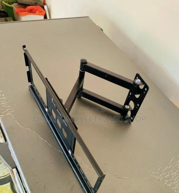 Latest Adjustable Corner Tv Mount for 32”-55”(Black) · Photo 1