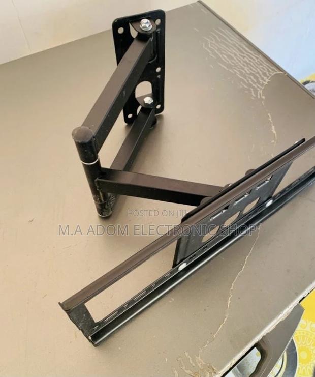 Authentic Adjustable Corner Tv Mount for 32”-55”(Black) · Photo 1