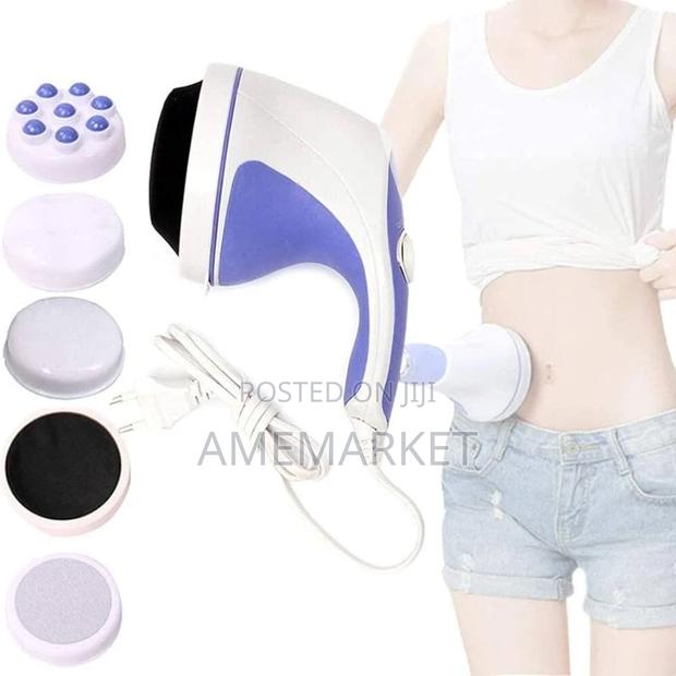 Stomach Massager Machine for Burning Fat Flat Tummy · Photo 1