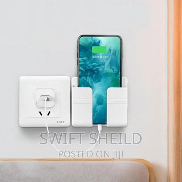 Adhesive Phone and Remote Wall Mount · Photo 2