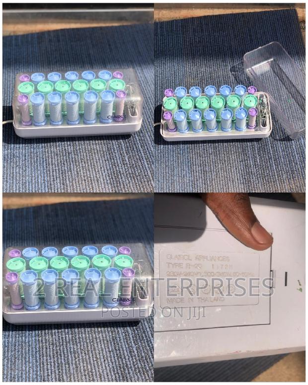Clairol 20 Hot Curl Controllers With Pins · Photo 1