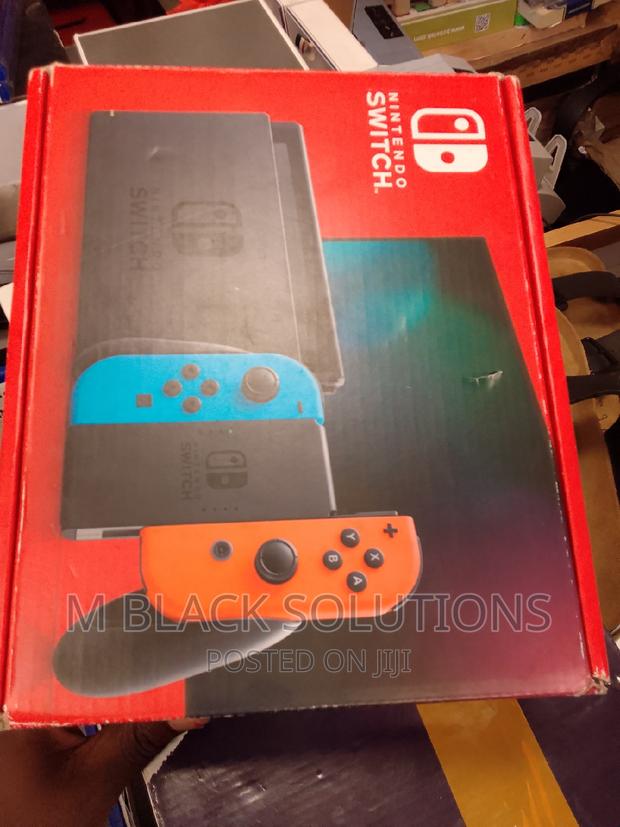 New Nintendo Switch With Blue and Red Joy-Con · Photo 2